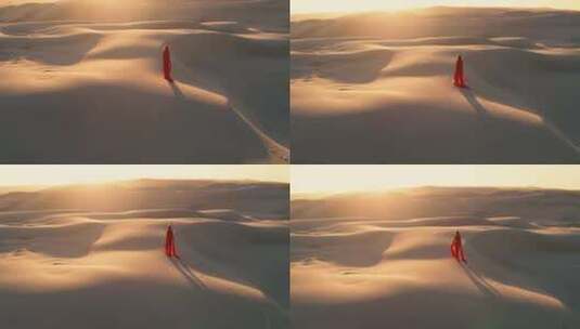 红衣美女行走在沙漠高清在线视频素材下载