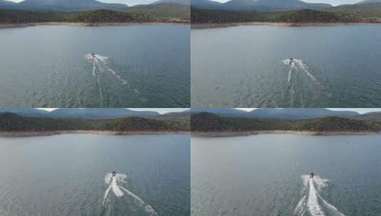航拍快艇在水面上巡航高清在线视频素材下载