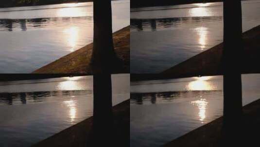 夕阳照射在湖水波光粼粼空镜高清在线视频素材下载
