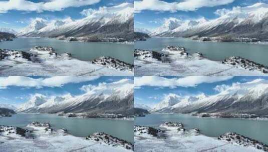 西藏昌都然乌湖和雪山雪地森林湖泊雪景航拍高清在线视频素材下载