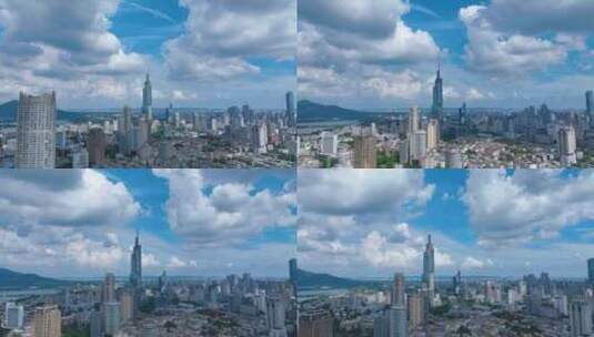 延时航拍南京地标建筑紫峰大厦上空的云彩高清在线视频素材下载