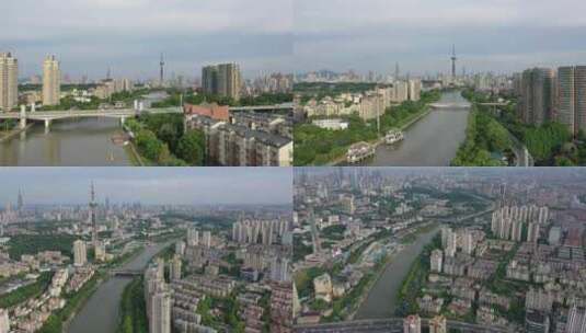 航拍南京秦淮河两边的高楼和电视塔高清在线视频素材下载