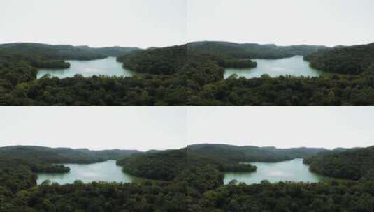 树木环绕的湖航拍高清在线视频素材下载