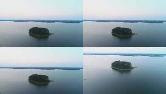 湖泊湖心岛湖中沙洲树木植被茂盛傍晚01高清在线视频素材下载