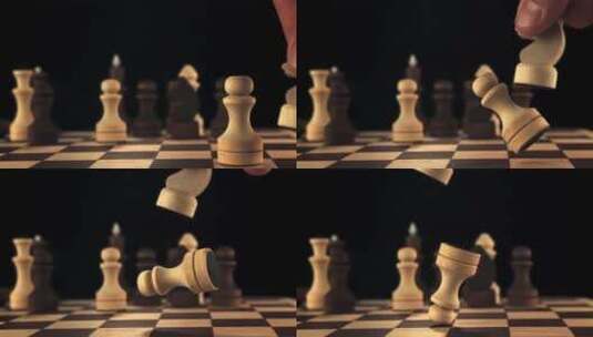 人的手把棋子从棋盘上碰倒慢动作高清在线视频素材下载