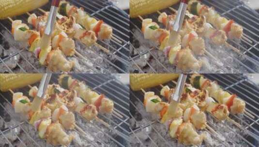 烧烤美味的鸡肉和蔬菜串高清在线视频素材下载