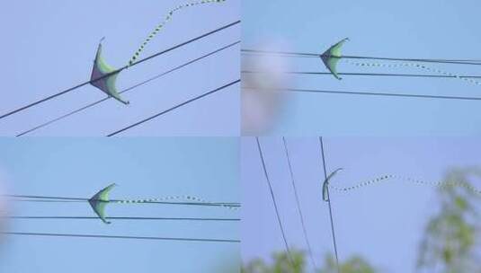 飘动的风筝 挂在电线上的风筝高清在线视频素材下载