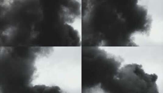 从建筑物上升起的黑烟云高清在线视频素材下载