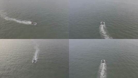 海边人群海岸线海上开游艇航拍高清在线视频素材下载