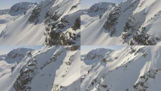 飞过布满岩石的雪山高清在线视频素材下载