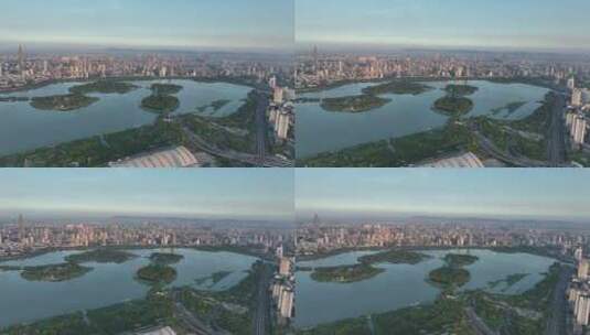 航拍日出阳光下的南京玄武湖和城区高清在线视频素材下载