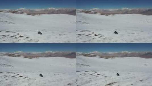 suv汽车越野行驶在一望无际的高山雪原高清在线视频素材下载