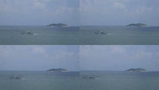 一条渔船驶过威海褚岛的海面高清在线视频素材下载