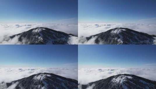 航拍湖北冬天神农架顶峰山顶雪景云海高清在线视频素材下载