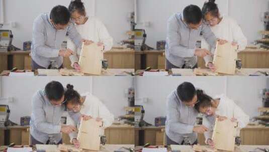父亲教孩子制作手工木艺高清在线视频素材下载