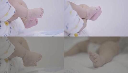 婴儿小脚特写 抱着婴儿小脚特写 蹬腿高清在线视频素材下载