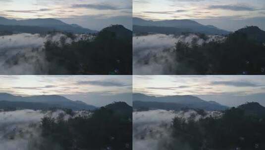航拍云雾缭绕的山峰高清在线视频素材下载