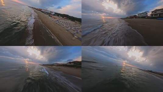 FPV无人机航拍海滩海边度假屋大海日落高清在线视频素材下载