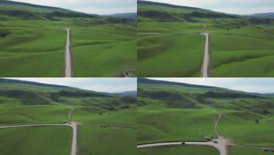 航拍新疆天山脚下琼库什台草原上的公路高清在线视频素材下载