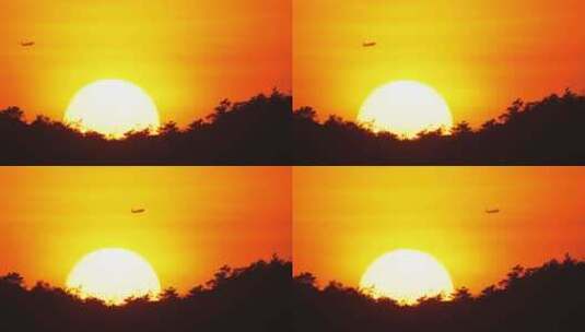 夕阳下飞机飞过高清在线视频素材下载