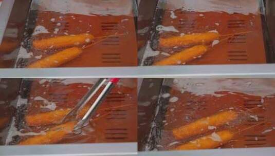 油锅中进行油炸的场景，非健康饮食概念高清在线视频素材下载