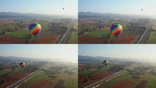 4k航拍田野上方彩色的热气球高清在线视频素材下载