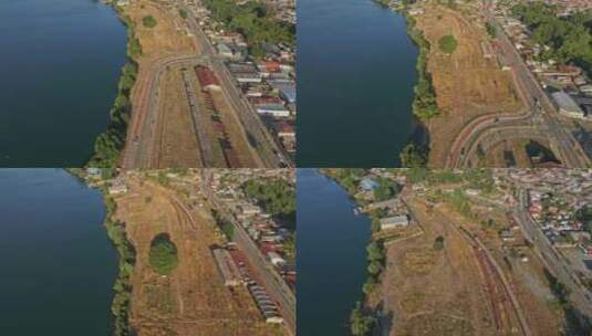 在靠近河流的道路上行驶的车辆高清在线视频素材下载