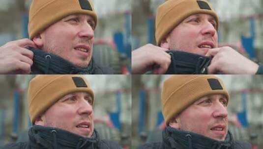 户外锻炼时疲劳的教练调整夹克领高清在线视频素材下载