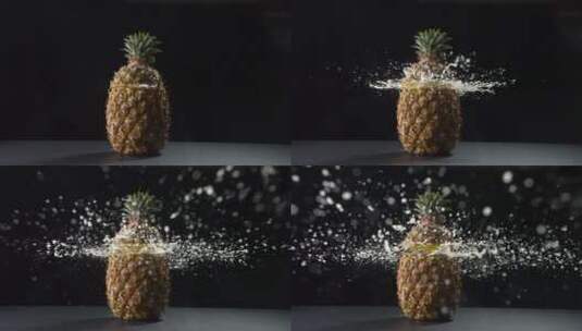 2.5K高速摄影黑底菠萝汁喷射而出高清在线视频素材下载
