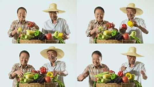 老年农民夫妇展示自家蔬菜高清在线视频素材下载