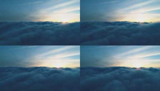 日落时分飞越厚厚的云层高清在线视频素材下载