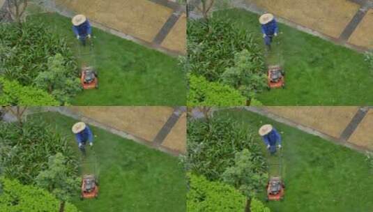 小区园丁割草机除草维护草坪高清在线视频素材下载