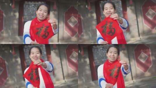 亚洲中国人女性家门口拜年新年快乐高清在线视频素材下载