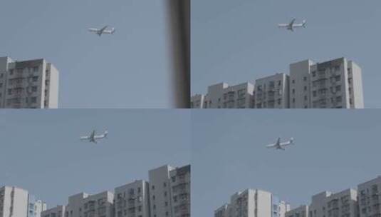 4K高清飞机飞过城市居民楼头顶-松下Vlog高清在线视频素材下载