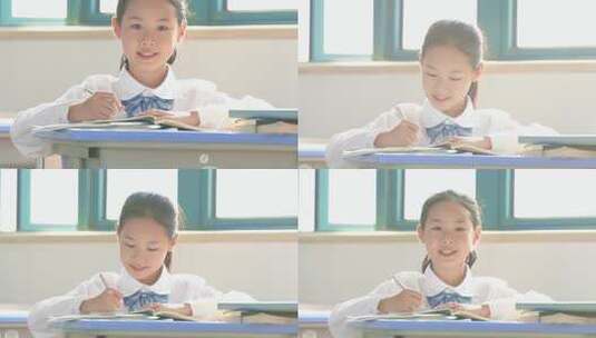 在教室认真学习的小女孩高清在线视频素材下载