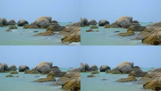 海南三亚大海边蓝色海浪拍打礁石岩石高清在线视频素材下载