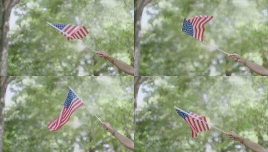 手拿美国旗帜在挥舞高清在线视频素材下载
