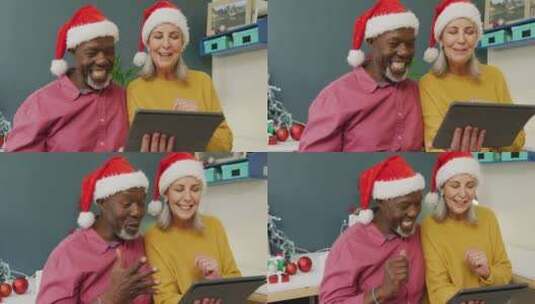 带圣诞帽的老人使用平板电脑高清在线视频素材下载