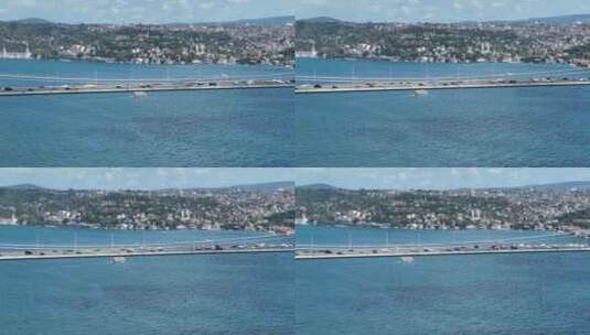 伊斯坦布尔博斯普鲁斯海峡大桥和城市天际线背景与土耳其国旗在美丽的日落高清在线视频素材下载