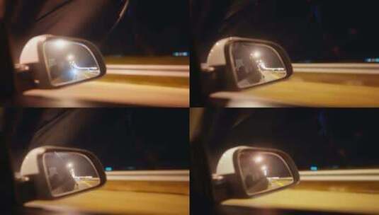 游夜晚的汽车行驶后视镜高清在线视频素材下载