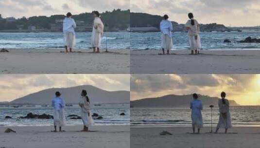大海沙滩观看日出的女性背影高清在线视频素材下载