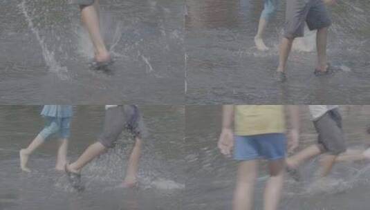 儿童在芝加哥千禧公园喷泉水池里奔跑足部4K高清在线视频素材下载