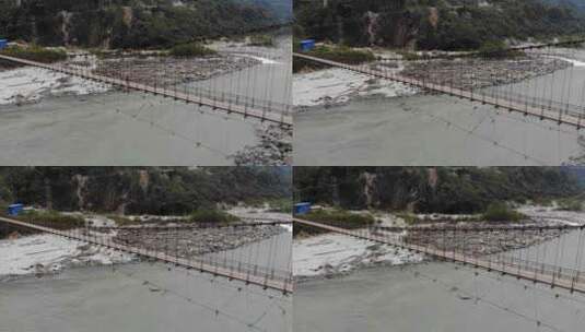 西藏林芝墨脱雅鲁藏布江大峡谷上的吊桥高清在线视频素材下载