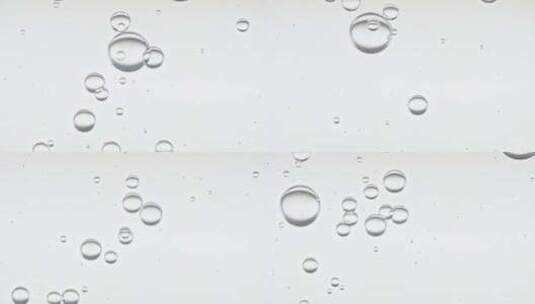 清水中不同大小透明气泡在白色背景体上上升高清在线视频素材下载
