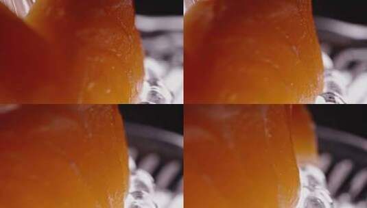三文鱼片鲑鱼日料刺身鱼肉生鱼片寿司特写高清在线视频素材下载
