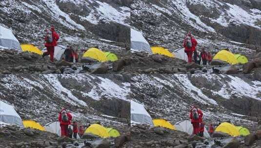 攀登贡嘎山区贡巴峰的登山者抵达C1营地高清在线视频素材下载