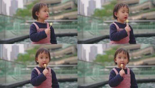 吃棒棒糖的小女孩高清在线视频素材下载