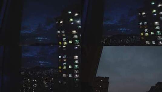 城市的火烧云夜晚的高楼高清在线视频素材下载