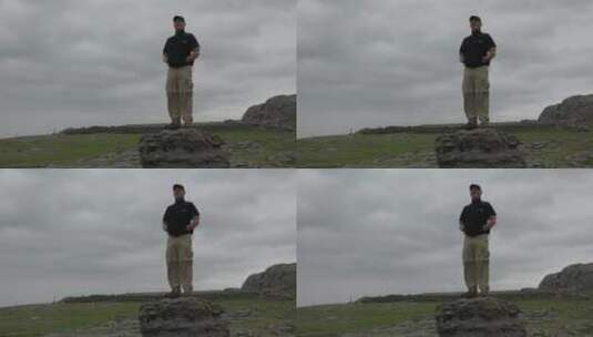 站在悬崖上的男人高清在线视频素材下载