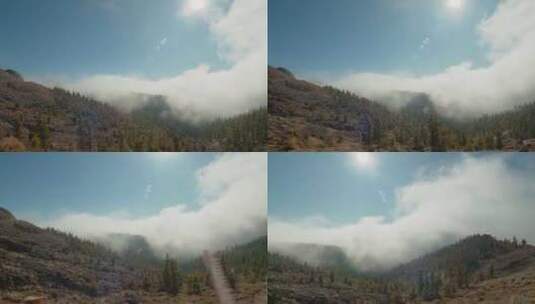 蓬松的云层覆盖的山坡高清在线视频素材下载